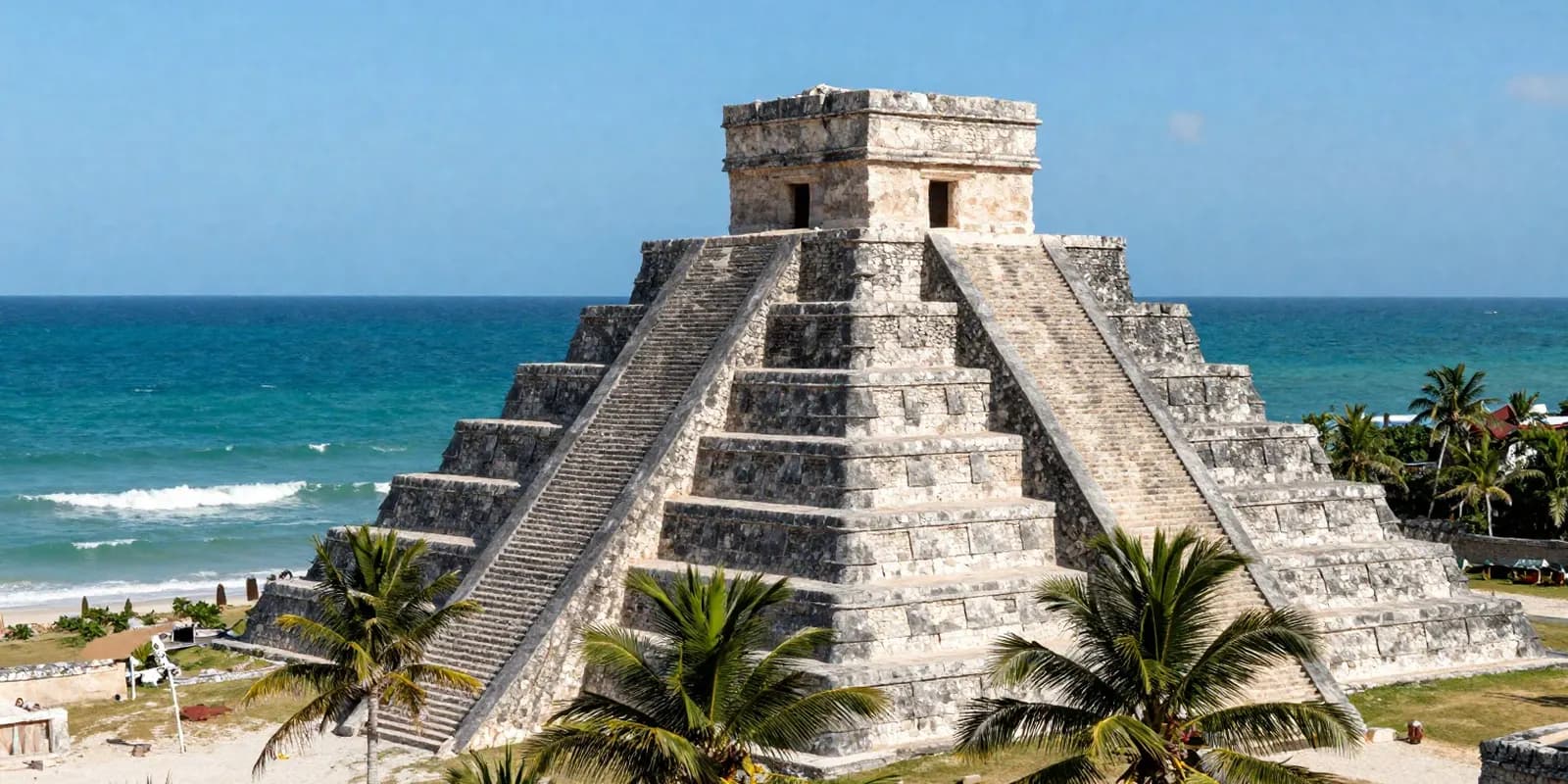 Ancient Maya ruins above the turquoise Caribbean sea on Mexico’s coast